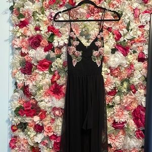 ROMPER WITH LONG SKIRT FLOWER DETAILS